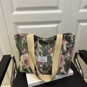 Large floral canvas tote bag with jacquard fabric and wide shoulder straps for women