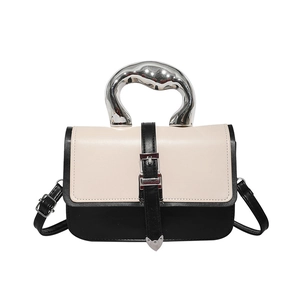 Fashionable bi-color crossbody bag with unique liquid metal silver handle and chic design