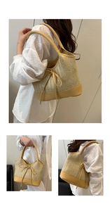 Close-up of woven straw tote bag with yellow leather trim and decorative drawstring bow