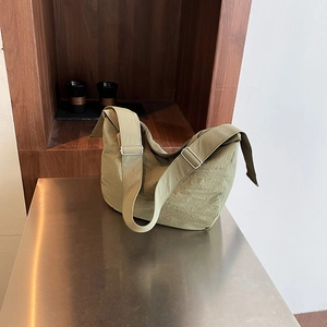 Olive green large capacity tote bag in soft nylon with adjustable wide shoulder strap