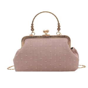 Elegante borsa da sera rosa vintage con manico dorato e tracolla a catena oro