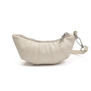 Mini cream crescent croissant bag with leather texture and silver zipper hanging style