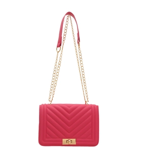 Pink quilted shoulder bag with V-pattern stitching and gold chain strap on white background