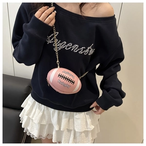 Pink rugby shaped shoulder bag with white stripes and elegant golden chain strap