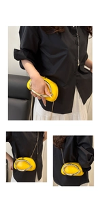 Three-way view of bright yellow acrylic chain bag with large oval silver metal handle