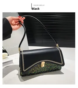 Detail of black sequins and beige V-shaped stitching on this elegant evening bag