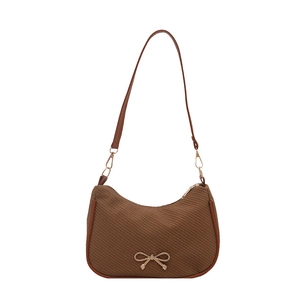 Vintage brown underarm bag with diagonal woven fabric and golden bow hardware detail