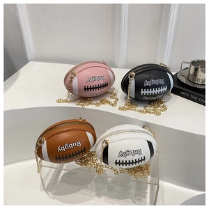 Macro view of four colorful rugby-shaped mini chain bags with pebble leather texture