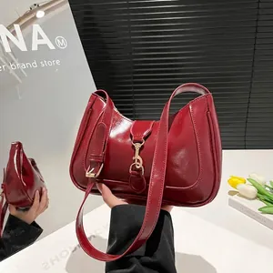 French style dark red glossy leather hobo bag with adjustable strap and gold buckle