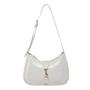 Minimalist cream semi-circle hobo bag with gold piston clasp and adjustable strap