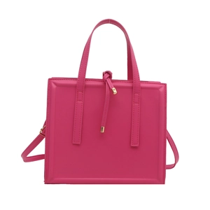 Stylish magenta square tote bag with knotted drawstring and gold metal accents