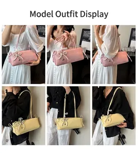 Model demonstrating the sweet underarm shoulder bag with elegant pearl bow decoration