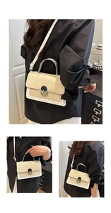 Detail of beige woven texture and white leather trim on a square crossbody bag
