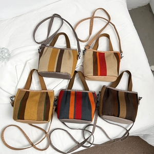 Versatile striped canvas tote bags for women featuring adjustable shoulder straps
