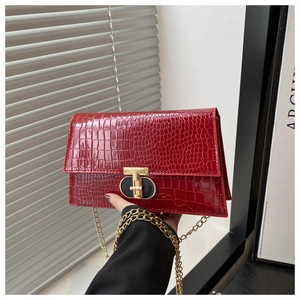Glossy red crocodile texture crossbody envelope bag with gold chain and T-bar metal lock