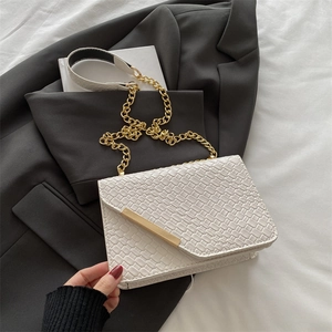 Elegant white woven flap shoulder bag with gold metal trim and chain strap details