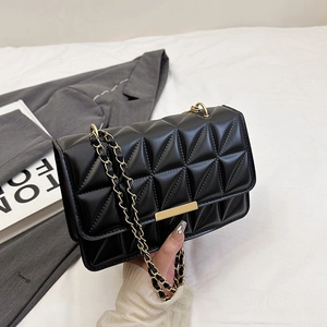Fashionable black quilted crossbody bag with gold buckle and chain strap for women
