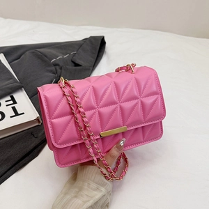 Chic pink quilted crossbody bag with gold chain strap and elegant metallic push-lock
