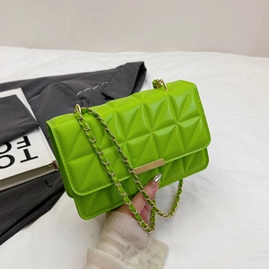 Lime green quilted crossbody bag with triangle pattern and gold chain strap for women