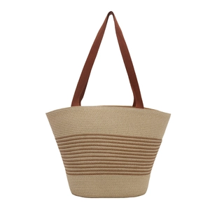 Light khaki woven tote bag with brown stripes for daily commute or beach vacation
