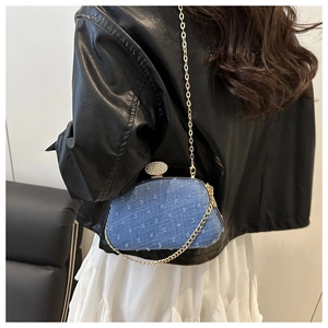 Blue denim texture crossbody bag with gold chain strap and diamond buckle