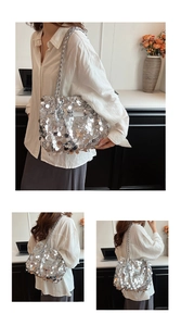 Detail showing shiny silver large sequins and woven shoulder strap on the tote bag