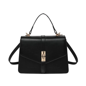 Klassische schwarze Trapez-Handtasche mit goldenem V-Klappverschluss und Tragegriff