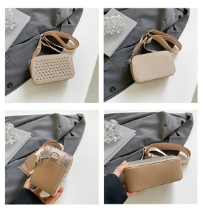 Detail view of stylish beige crossbody bags with metal rivets and glitter finish