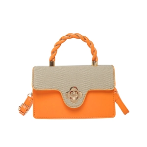 Minimalist orange and beige contrast handbag with clover lock and top handle