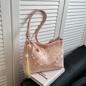 Pink large capacity hobo bag with lace floral texture and butterfly embroidery details