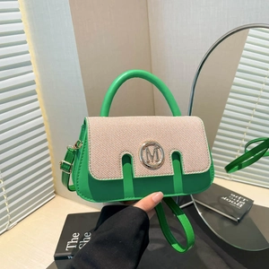 Green leather and beige fabric patchwork square handbag with metallic M logo and strap
