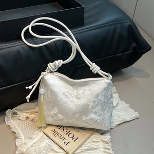 Elegant white lace shoulder bag with butterfly embroidery and silk tassel detail