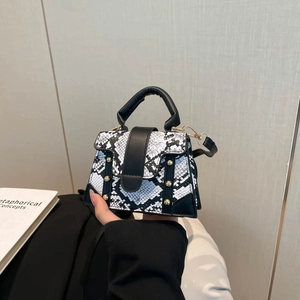 Chic snakeskin print mini square handbag with black flap and gold rivet accents
