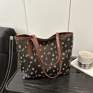 Fashionable black cherry print tote bag with brown straps for women's daily commute