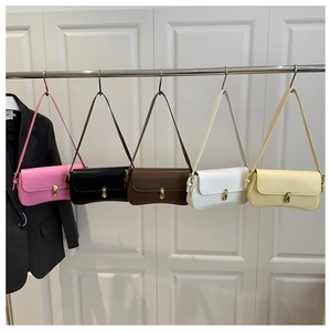 Detailed row of stylish rectangular flap handbags in five colors with gold lock detail