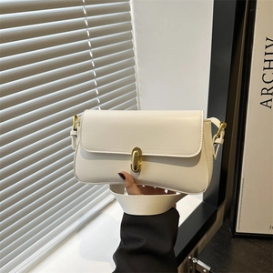 Minimalist white faux leather shoulder bag with elegant gold metal rotating twist lock
