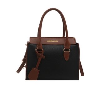 Fashion contrast color crossbody bag with black lychee leather and brown handles
