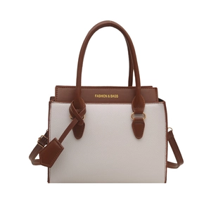 Fashionable two-tone PU leather tote bag with top handles and adjustable shoulder strap