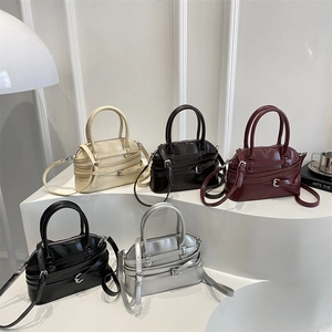 Fashionable shell-shaped handbag with belt buckle detail in five elegant colors