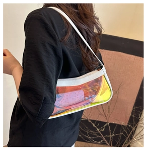Iridescent jelly shoulder bag with white leather trim shown on model for size and fit