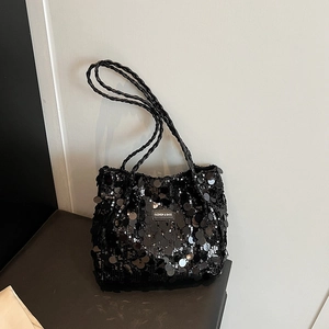 Sparkly black sequin tote bag with woven straps and a fashion label, stylish shoulder bag