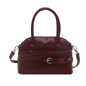 Retro burgundy bowling bag with silver grommets and straps for summer commute style