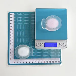 Detailed view showing taiyaki phone socket size and weight measurement on a scale