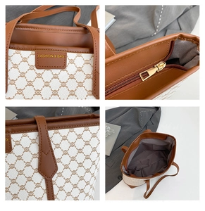 Detailansicht der großen Shopper-Tasche mit braunem Logomuster und robustem Reißverschluss