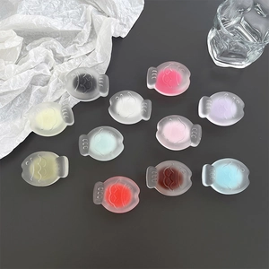 Set of 10 colorful fish-shaped phone socket grips with a matte frosted finish