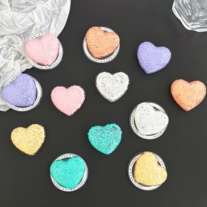 Multi-colored heart glitter phone grips set on black background with Gift For You label