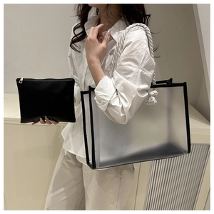 Detail of pink PVC tote and small zipper pouch with thick white rope handles