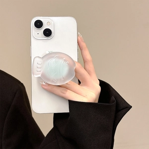 Detail of translucent frosted Taiyaki phone socket grip on white smartphone