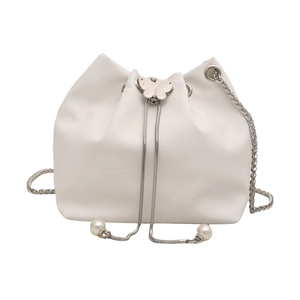 White crocodile pattern bucket bag with silver butterfly charm and pearl chain strap