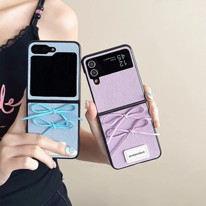 Minimalistische Handyhülle mit Schleife aus Leder für Samsung Z Flip und Huawei P50 Pocket